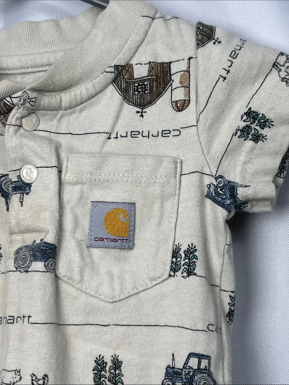 Carhartt tan farm print one piece Henley pocket tee. Size 6 months